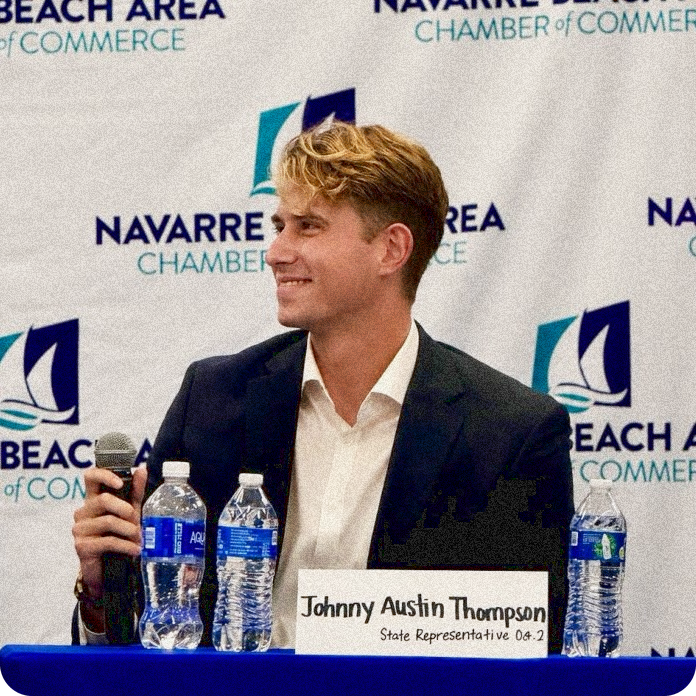 Johnny Austin Thompson speaking at a chamber of commerce event